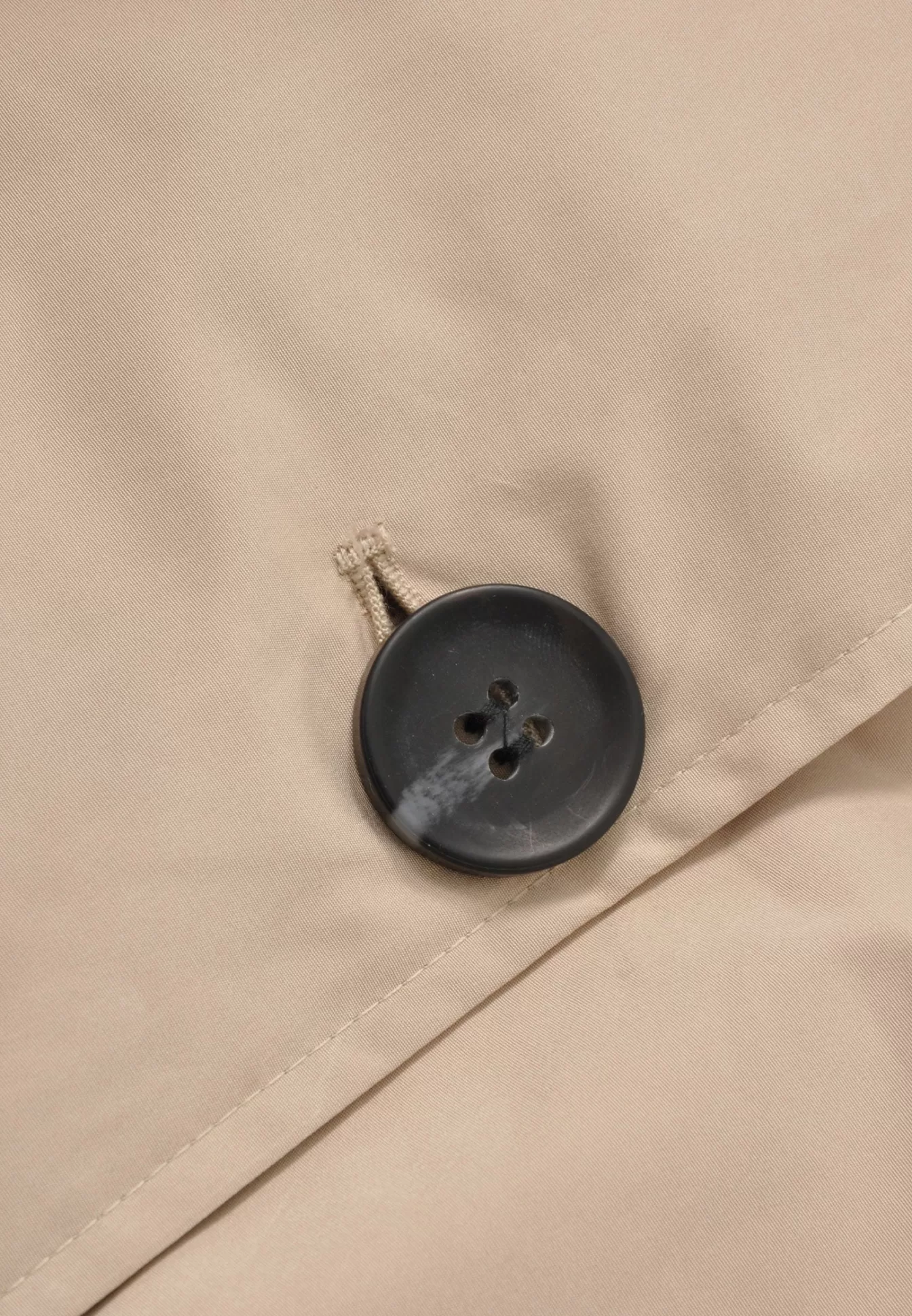 Découvrez l'imperméable classique YOEK - Marron foncé, essentiel pour toutes les saisons